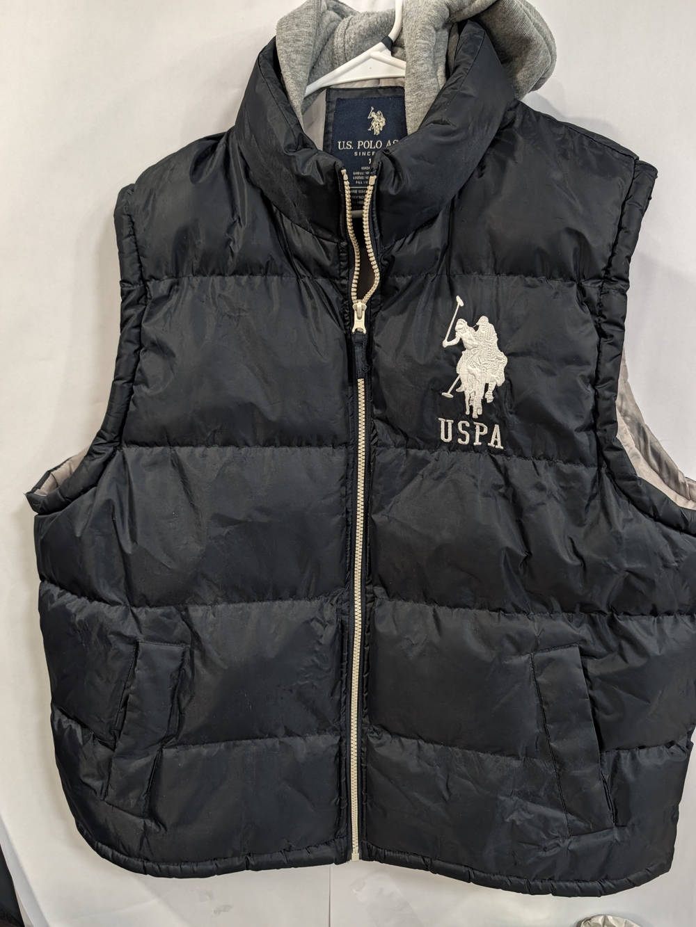 U.S. Polo Assn. navy puffer vest with white logo